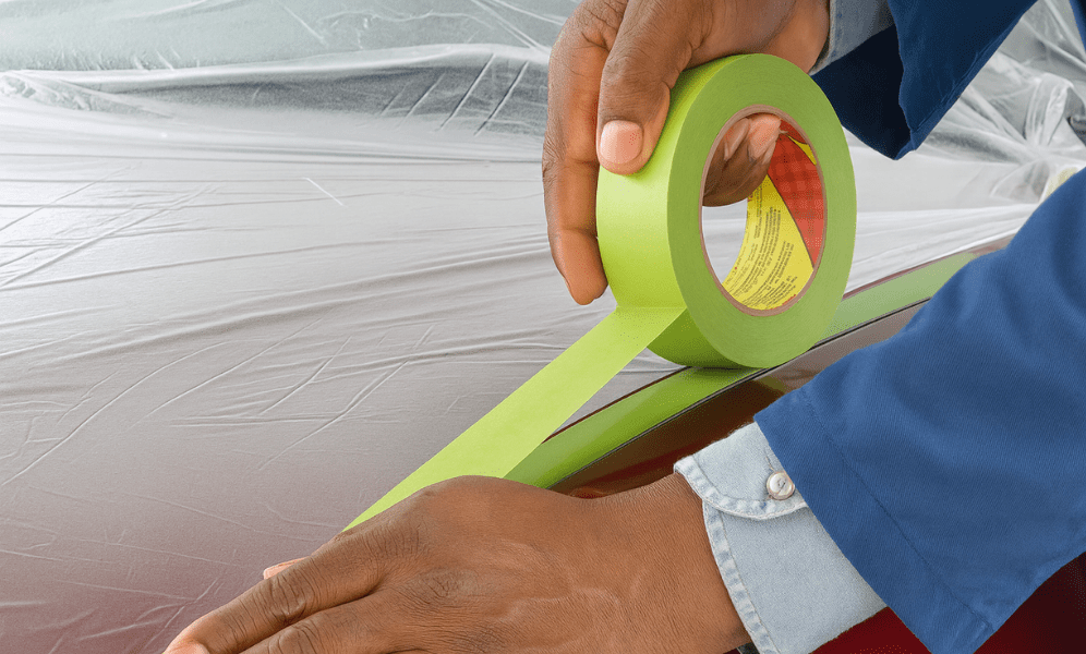 Yellow coloured tape used to place the covering on a vehicle.