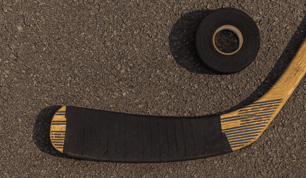 Hockey tape wrapped around a hockey stick.