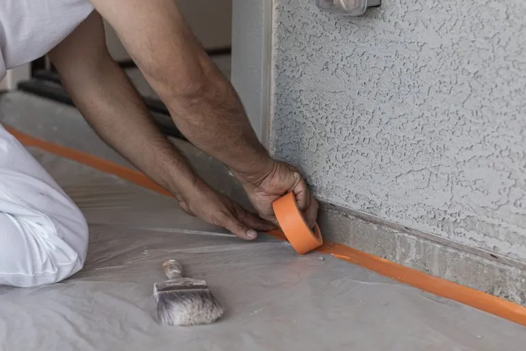 Applying painters tape helps any painting job be neater and more efficient